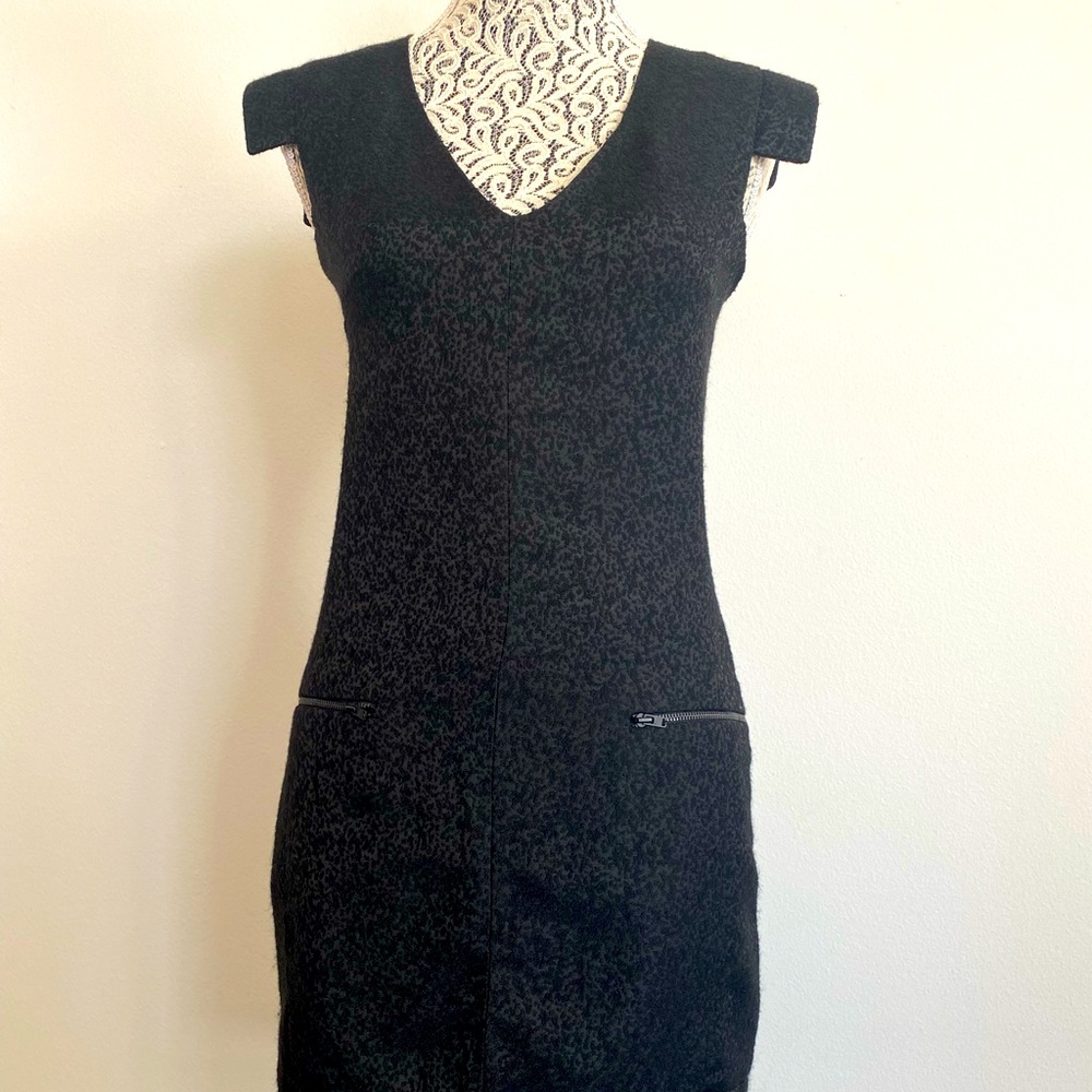 Form fitting formal black sheath dress with wool dotted pattern